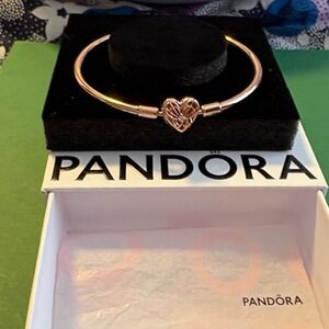 New with no tags Pandora moments heart, butterfly bangle bracelet.
